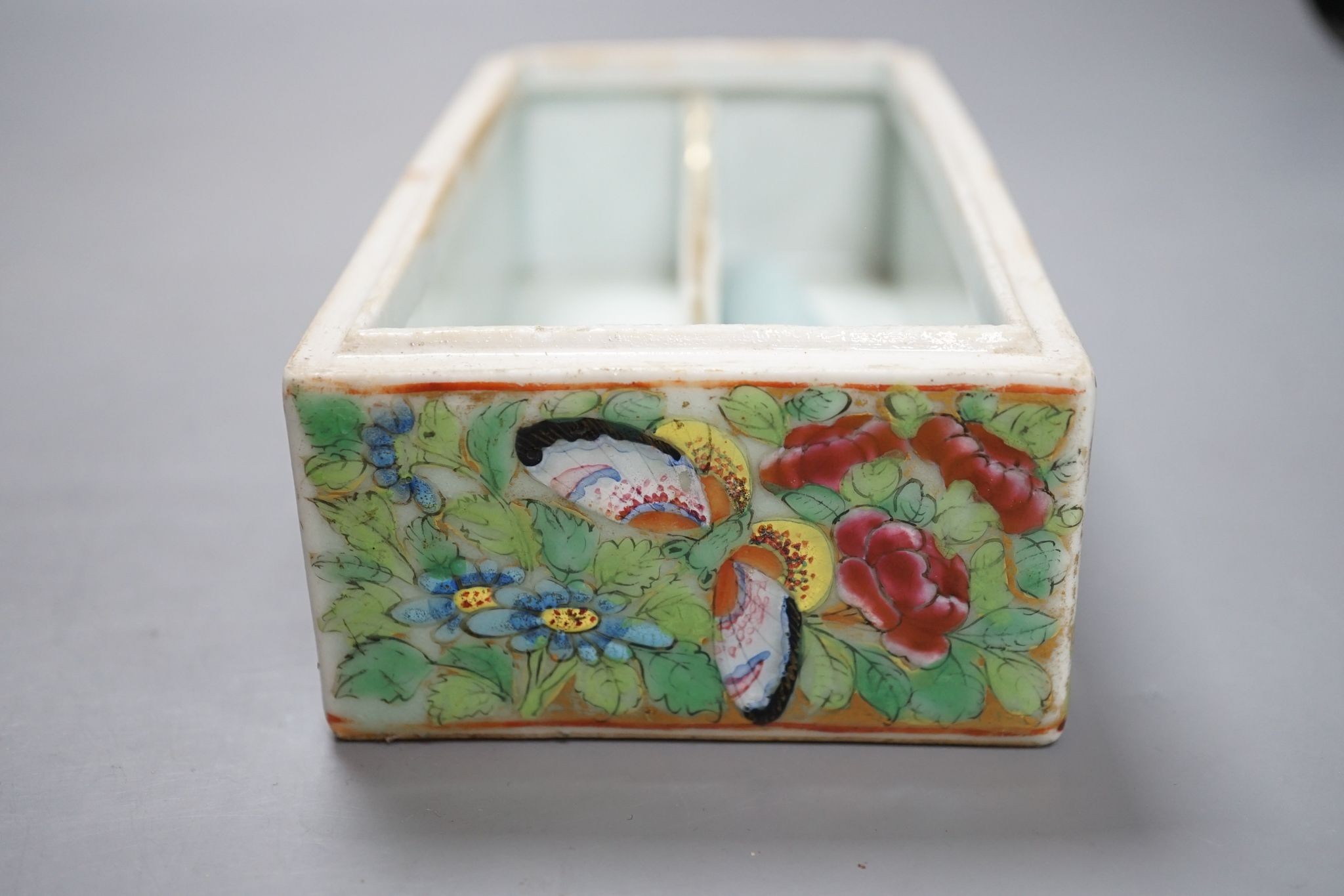 A Canton famille rose pen box, restored, 19cm